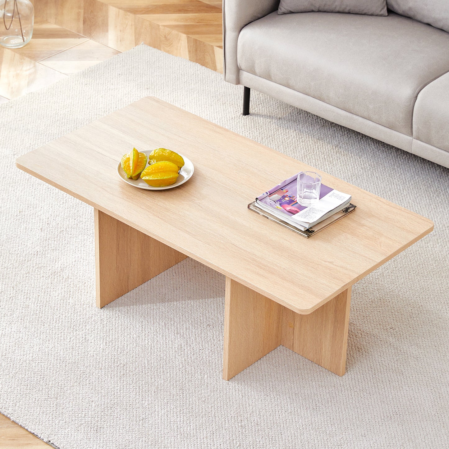 A wood colored coffee table.