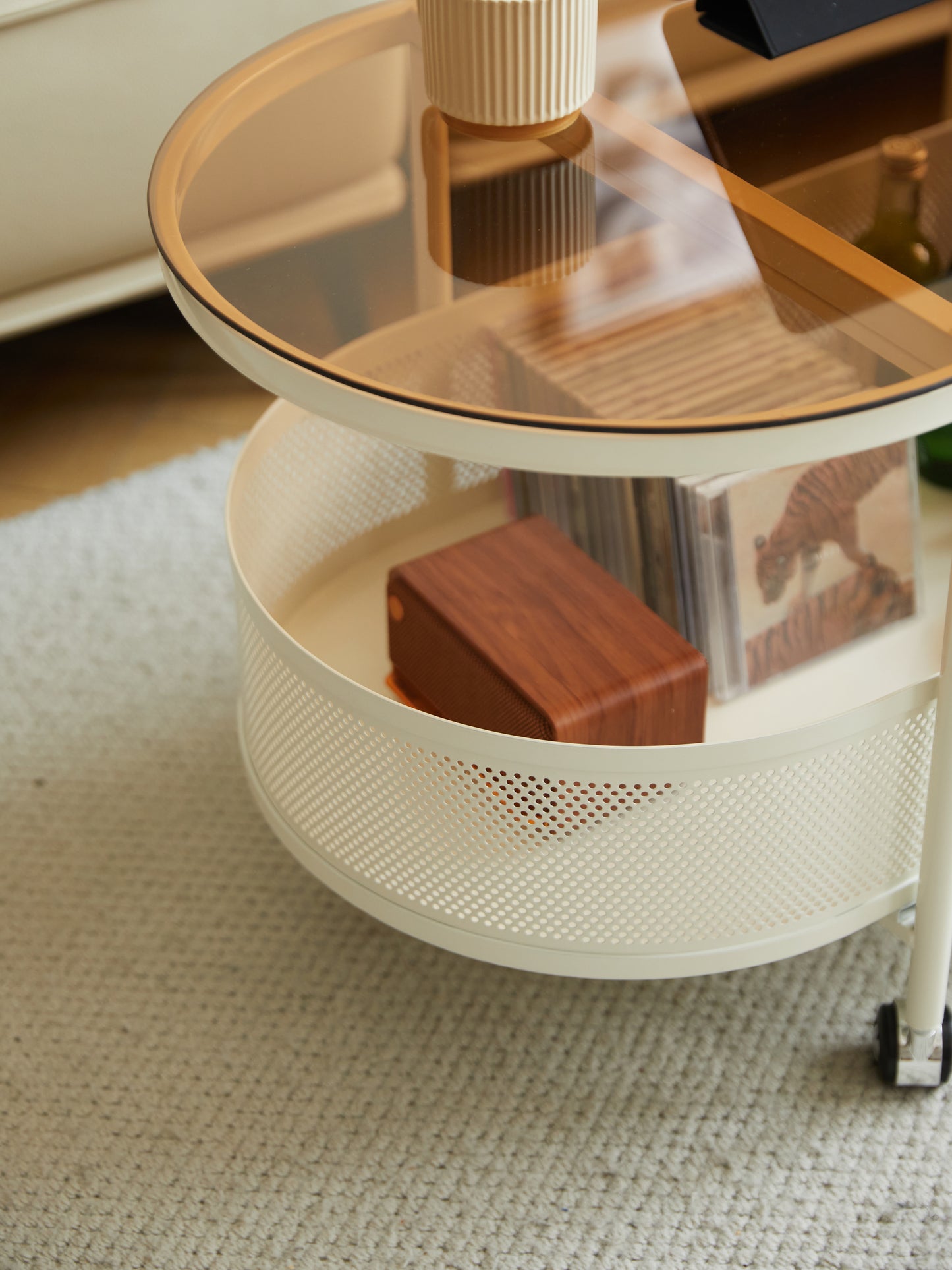 Movable oval metal glass coffee table with storage