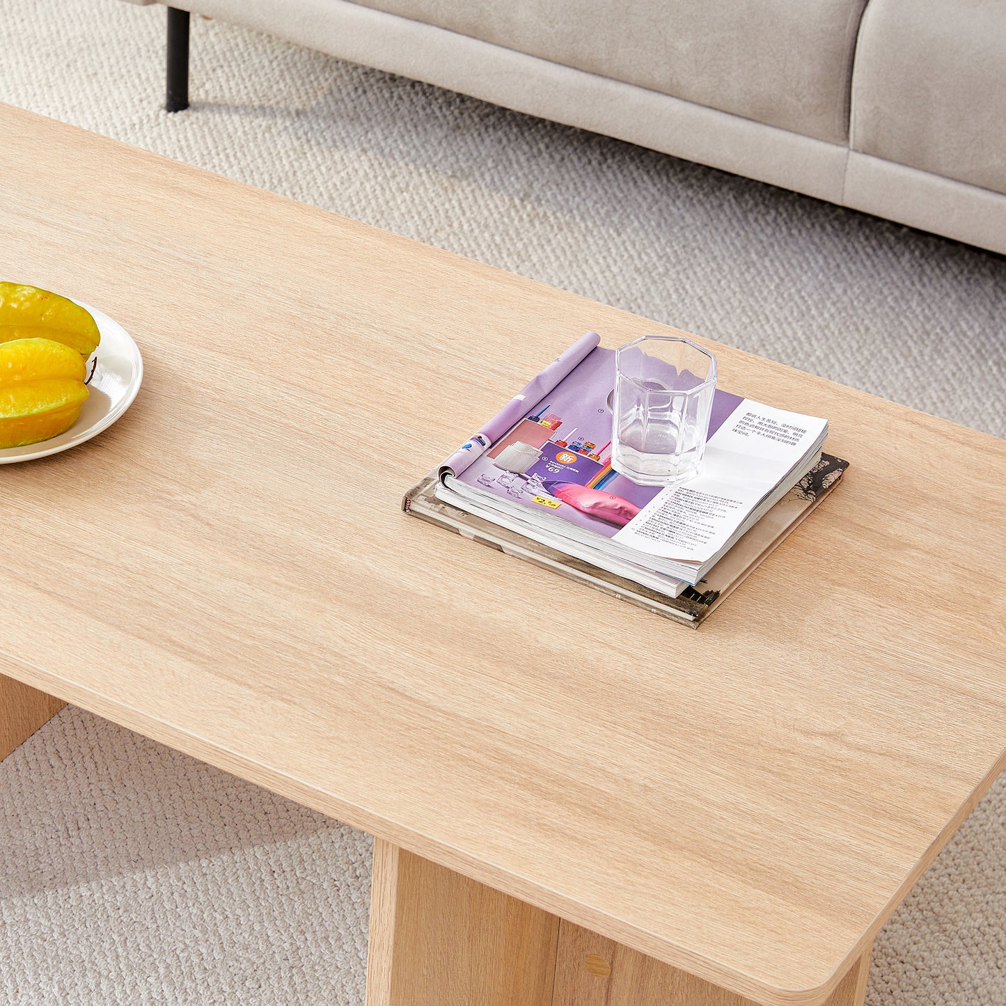 A wood colored coffee table.