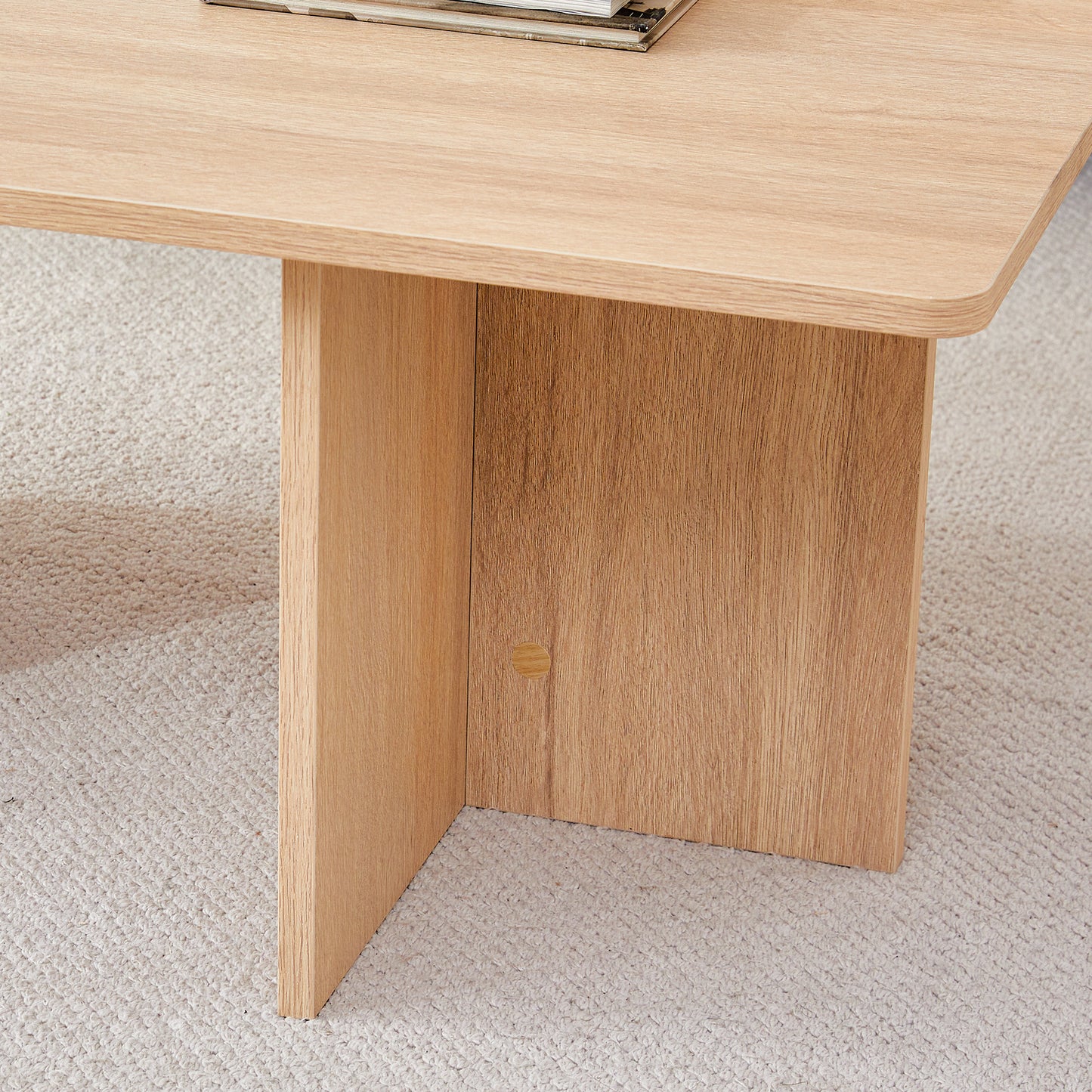 A wood colored coffee table.