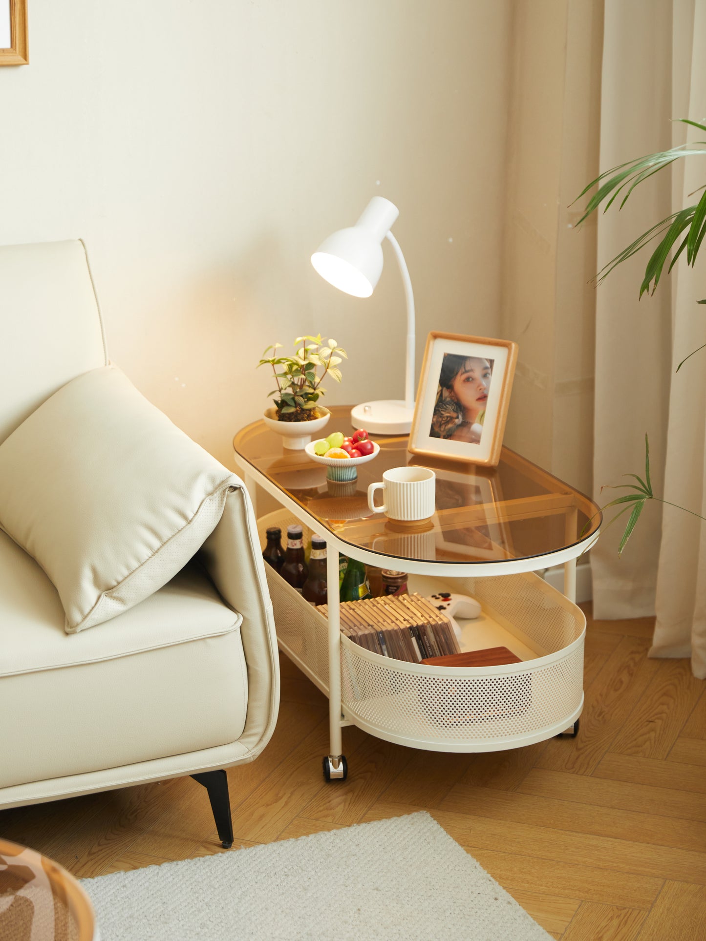 Movable oval metal glass coffee table with storage